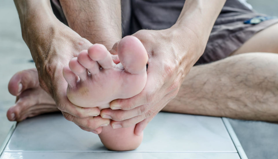 mans-hand-being-massaged-a-foot-sportreat-services-podiatry